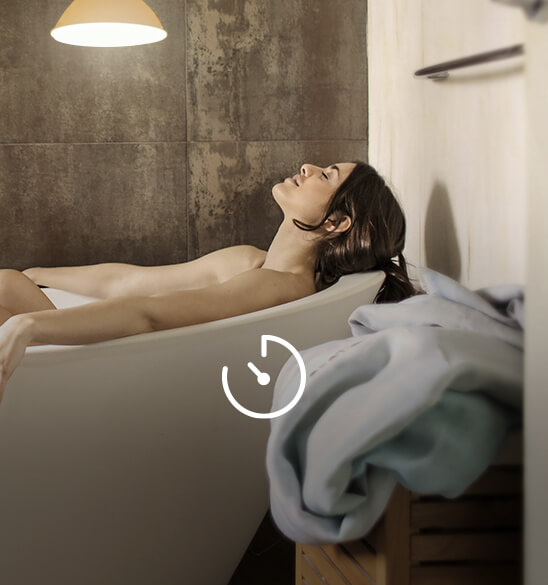 A woman is soaking