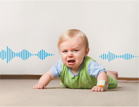 A child is crying with a sound wave curve next to it