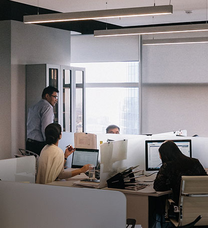 4 people is working in a office